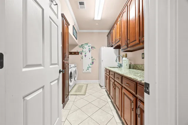 a view of a living room and kitchen with furniture