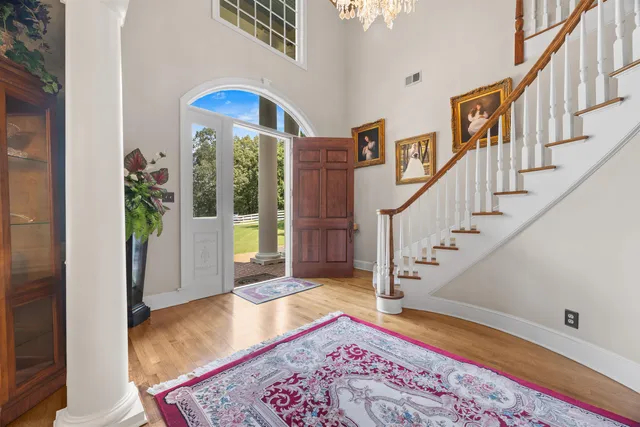 a view of an entryway with a rug