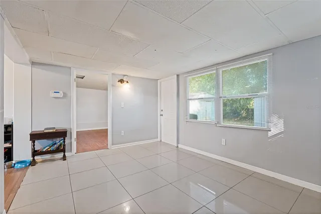 a view of an empty room with a window