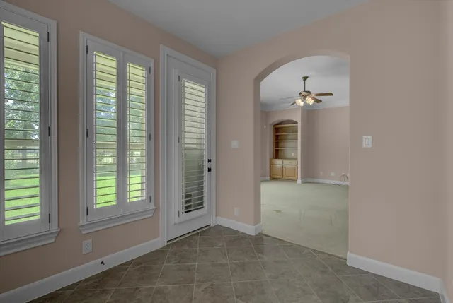 an empty room with windows