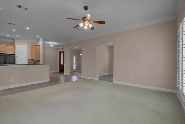 a view of a livingroom and a chandelier