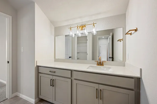 a bathroom with a toilet and a bathtub