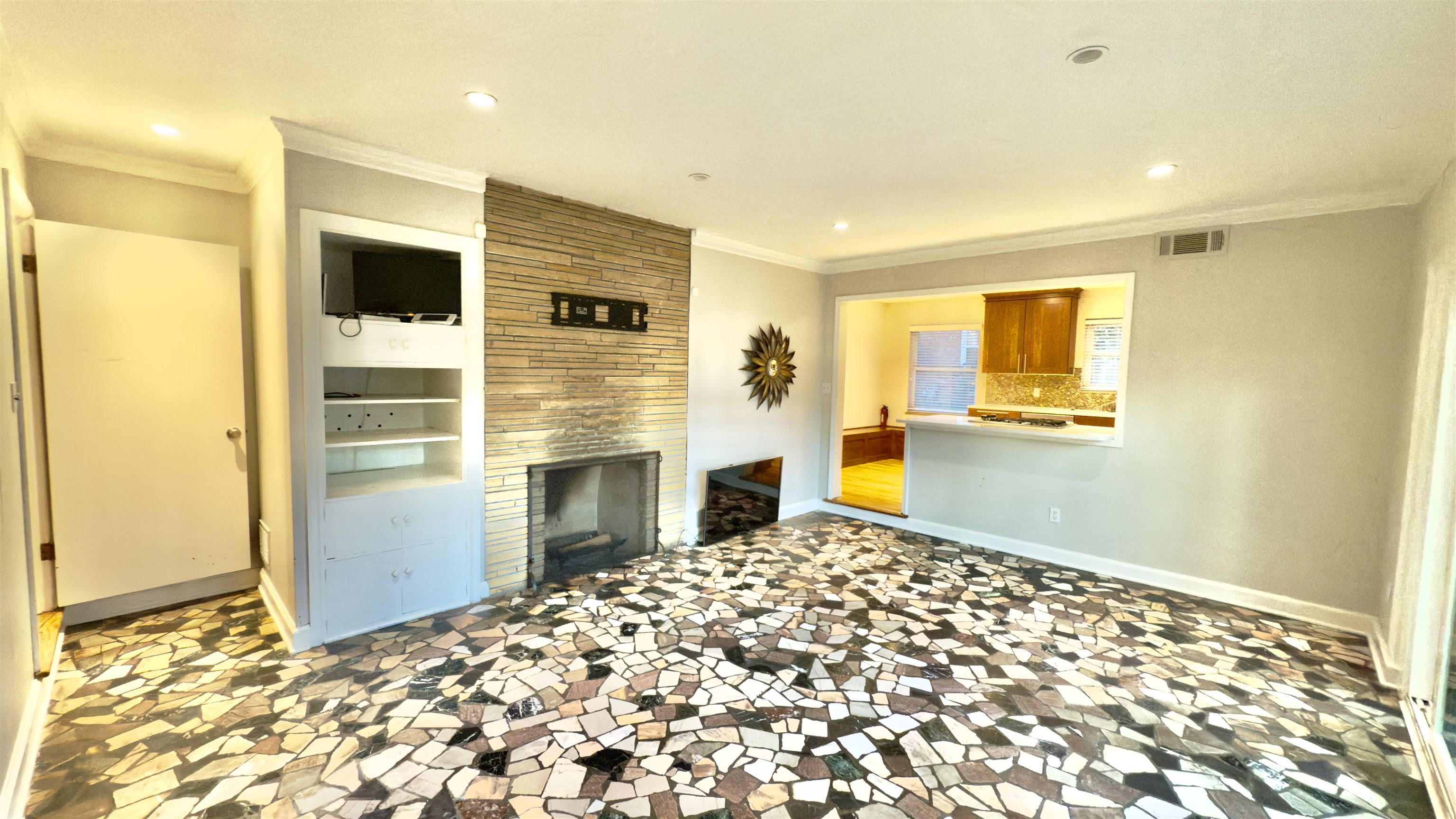 5209 Walnut Grove Road Memphis, TN 38117 - Photo 12 of 30 a bedroom with a bed and a fireplace