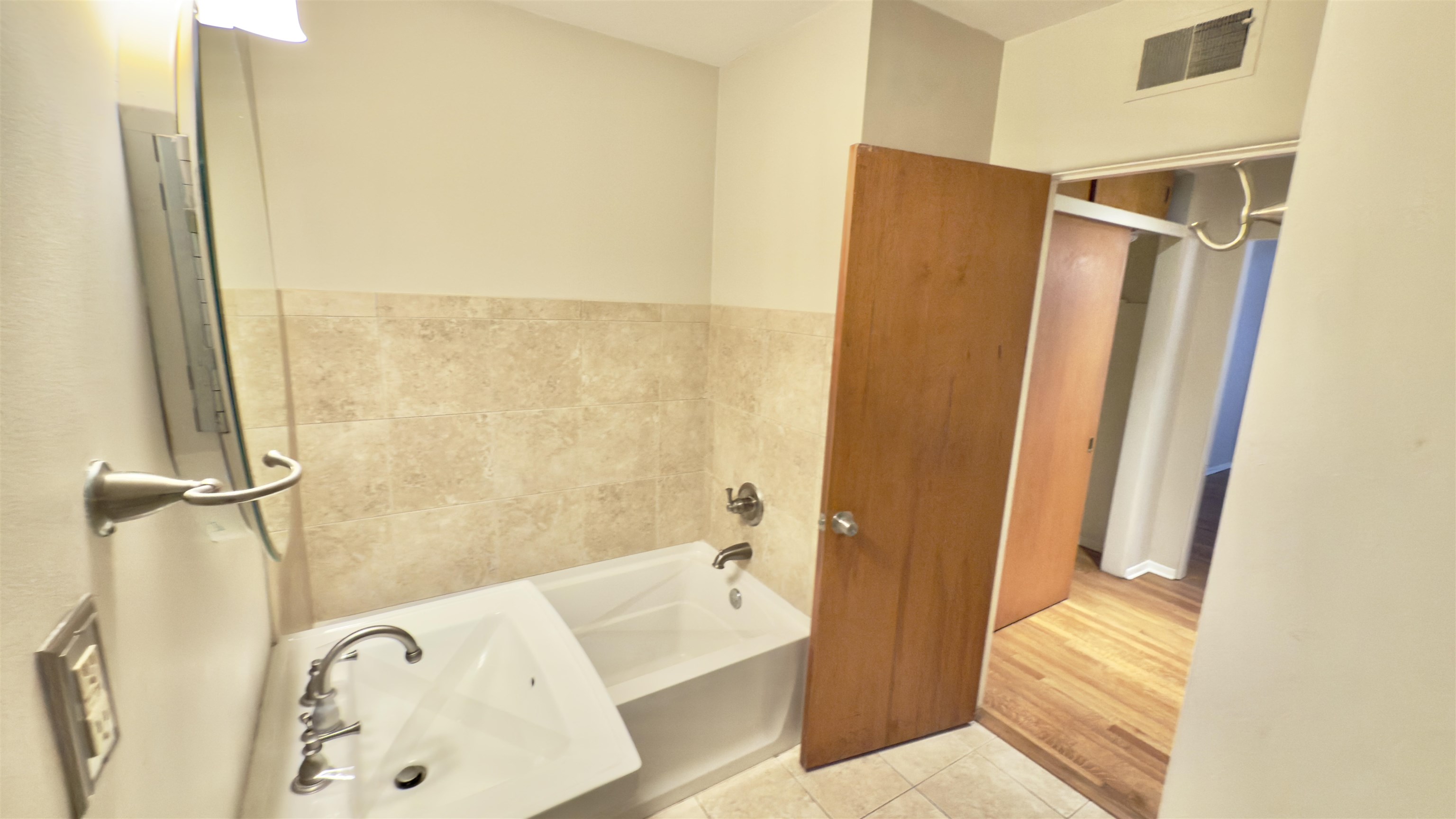 5209 Walnut Grove Road Memphis, TN 38117 - Photo 16 of 30 a bathroom with a tub and a shower