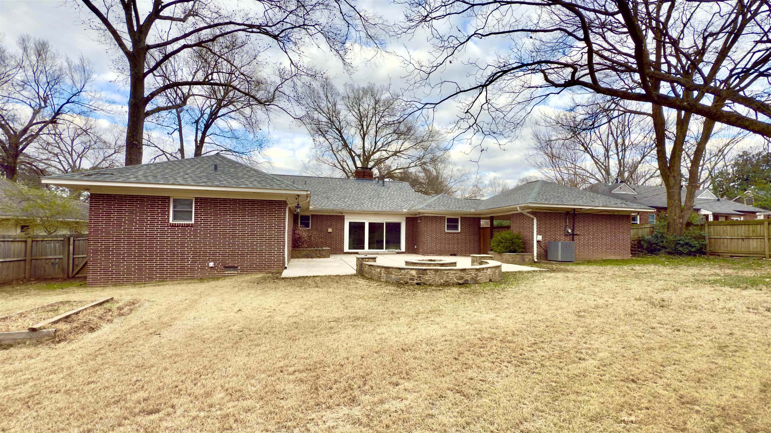 5209 Walnut Grove Road Memphis, TN 38117 - Photo 28 of 30 a view of a house with a yard covered with snow in front of it