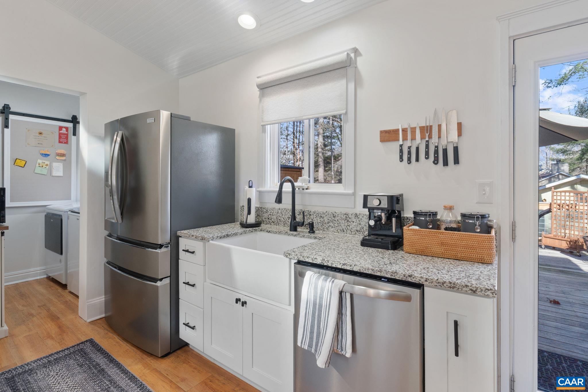 1 Hatchechubee Road Palmyra, VA 22963 - Photo 11 of 48 a kitchen with stainless steel appliances granite countertop a refrigerator and a sink