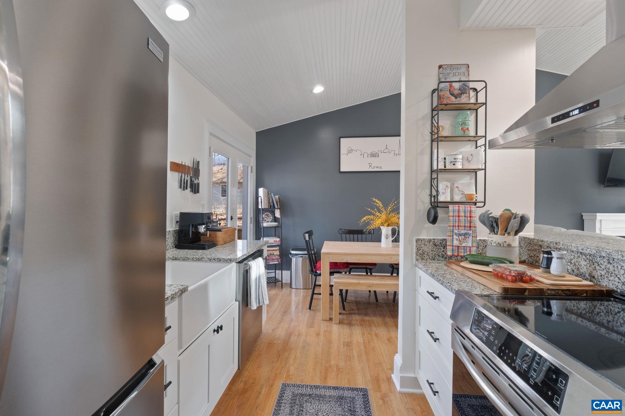 1 Hatchechubee Road Palmyra, VA 22963 - Photo 14 of 48 a living room with stainless steel appliances furniture a rug and a kitchen view