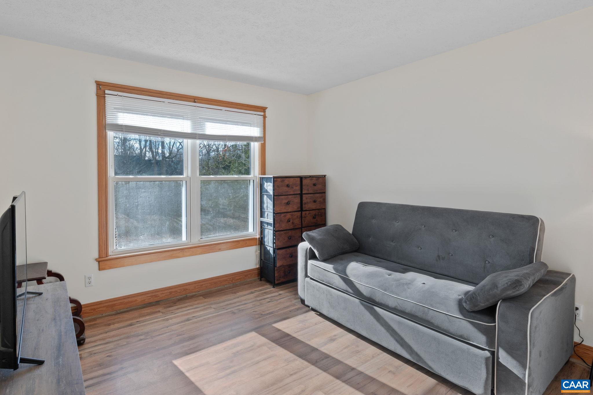 1 Hatchechubee Road Palmyra, VA 22963 - Photo 23 of 48 a living room with furniture and a window