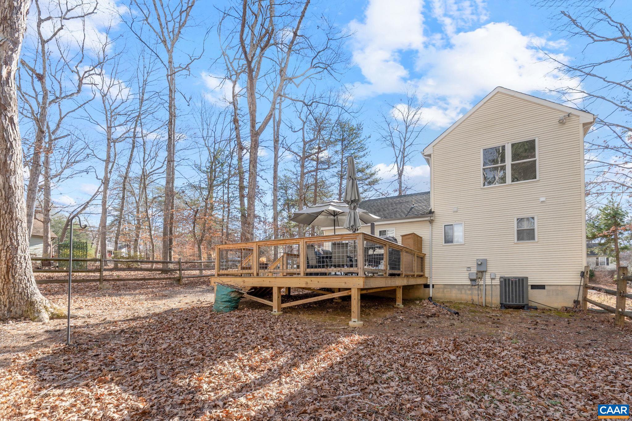 1 Hatchechubee Road Palmyra, VA 22963 - Photo 29 of 48 a backyard of a house with barbeque oven table and chairs