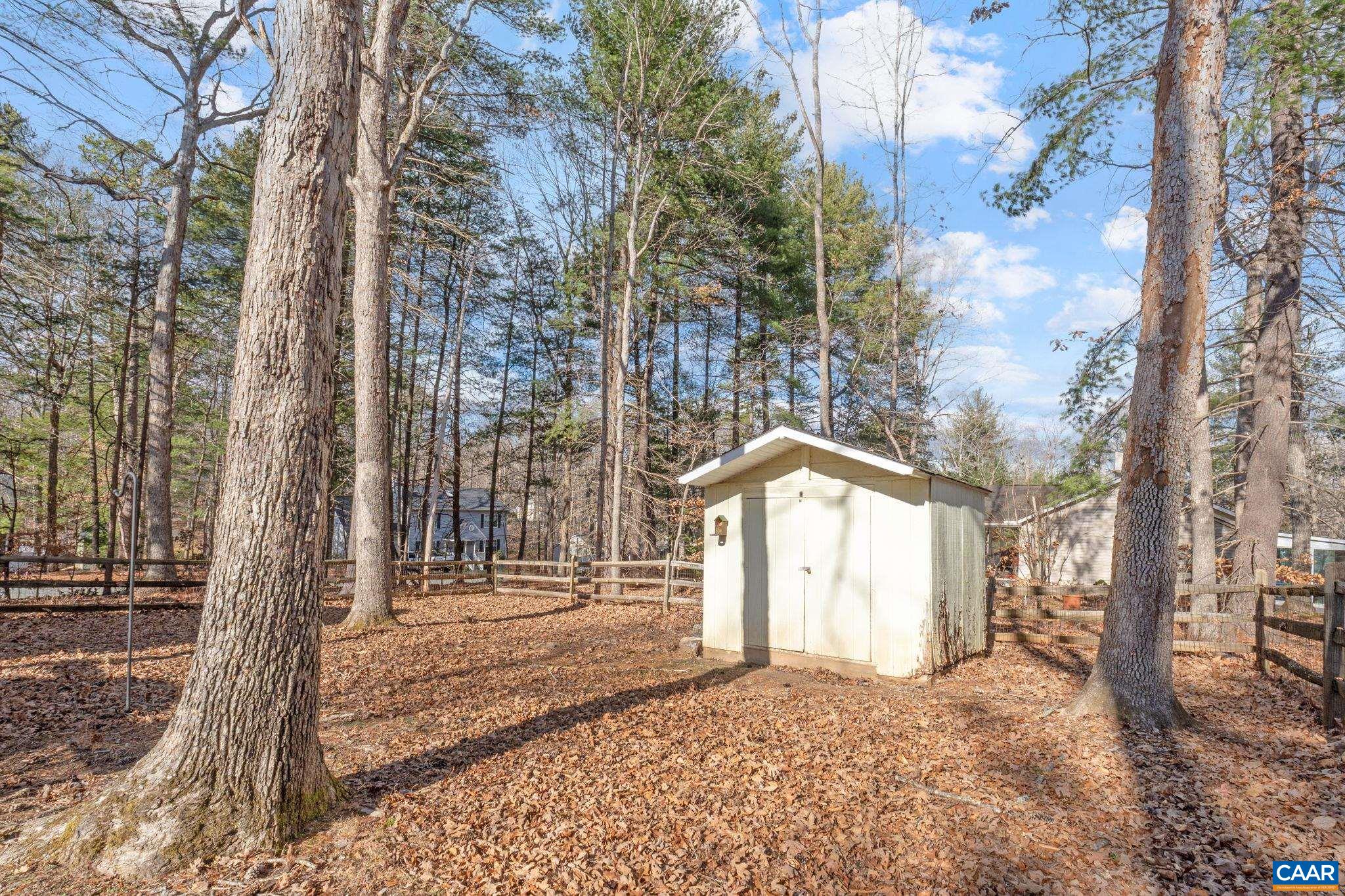 1 Hatchechubee Road Palmyra, VA 22963 - Photo 33 of 48 a house with trees in front of it