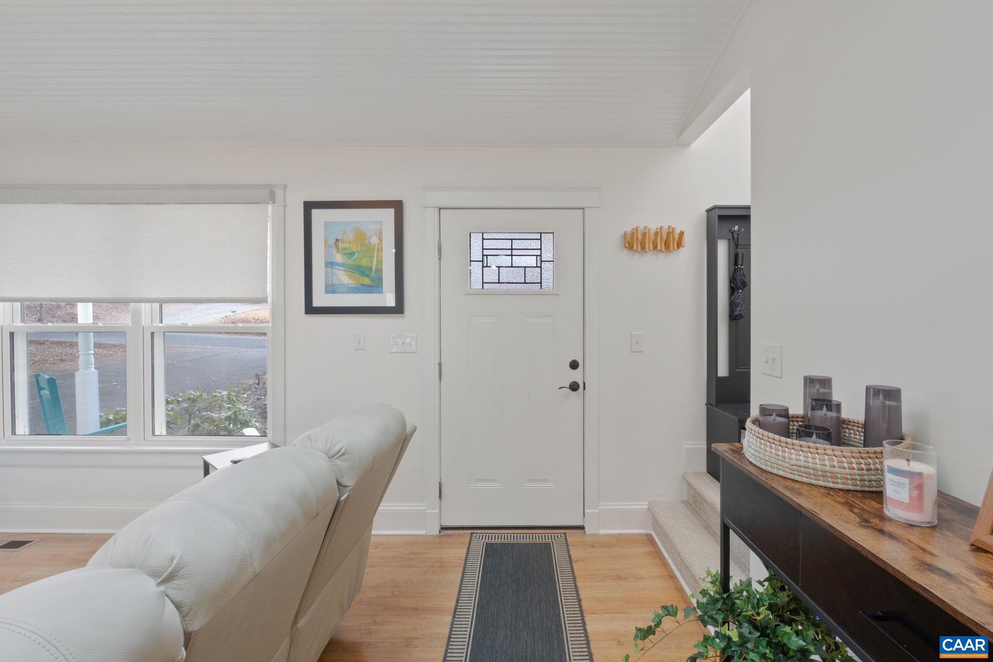 1 Hatchechubee Road Palmyra, VA 22963 - Photo 4 of 48 a living room with furniture and a floor to ceiling window