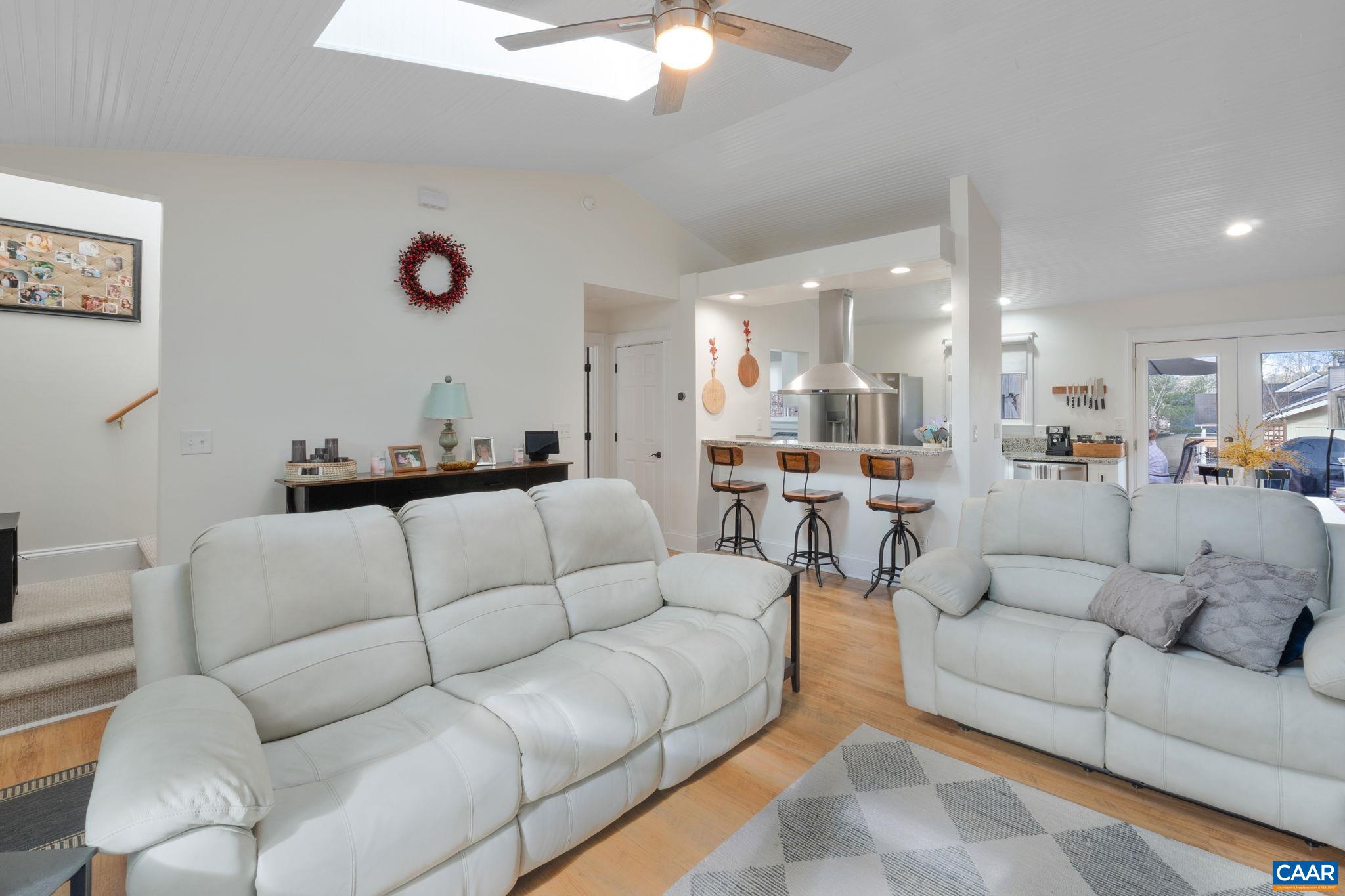 1 Hatchechubee Road Palmyra, VA 22963 - Photo 8 of 48 a living room with furniture kitchen view and a chandelier