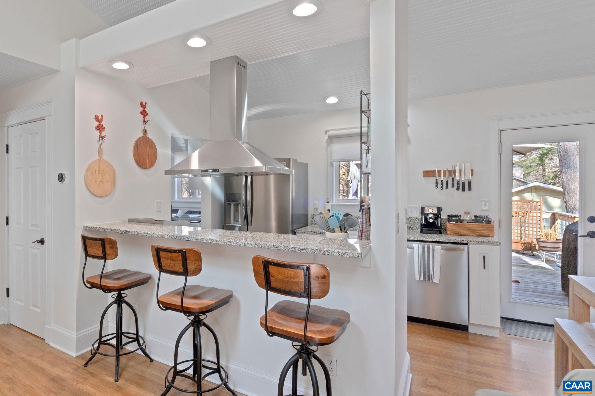 1 Hatchechubee Road Palmyra, VA 22963 - Photo 9 of 48 a kitchen with stainless steel appliances granite countertop a stove and cabinets