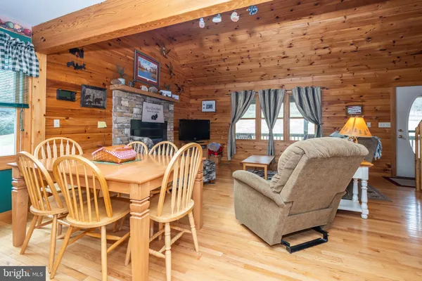 a view of a patio with couches and potted plants