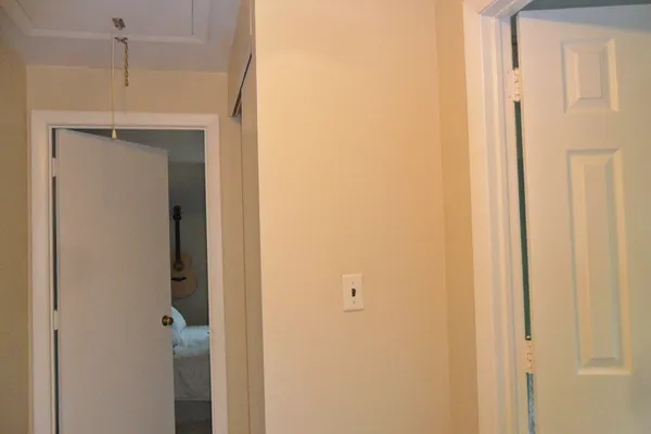 a bathroom with a shower and a door