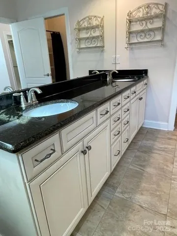 a close view of sink and mirror