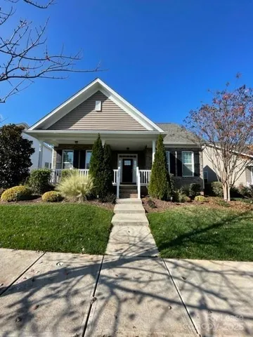 a view of a house with a garden