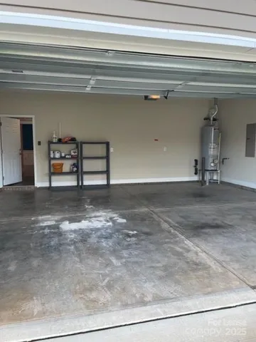 a view of a room with a furniture and a window