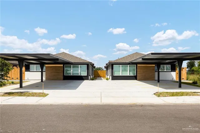 a house with yard in front of it