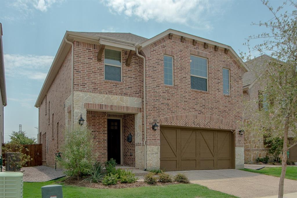 3412 Damsel Sauvage Lane Lewisville, TX 75056 - Photo 1 of 28 a front view of a house with garden