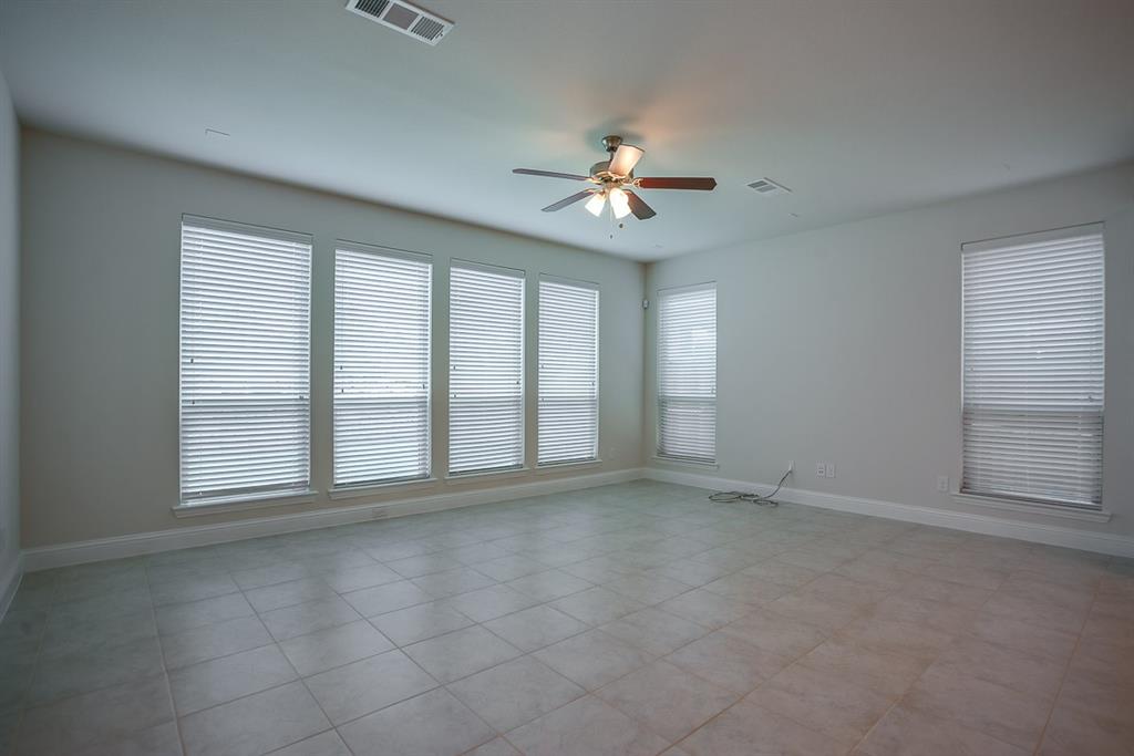 3412 Damsel Sauvage Lane Lewisville, TX 75056 - Photo 14 of 28 a view of an empty room with a window