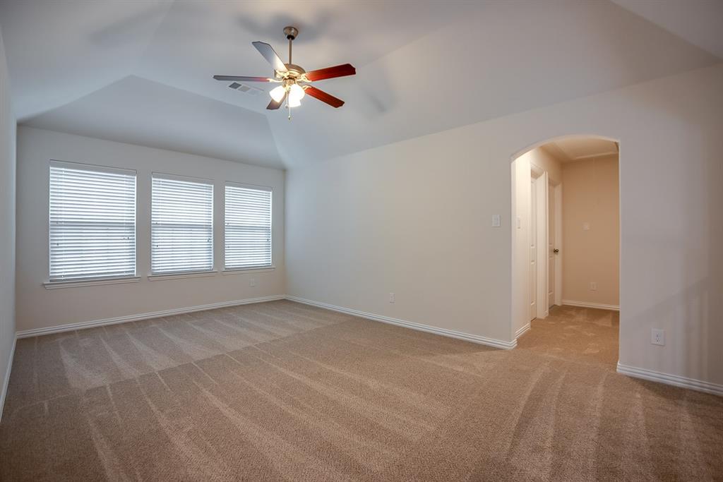 3412 Damsel Sauvage Lane Lewisville, TX 75056 - Photo 15 of 28 a view of an empty room with a window