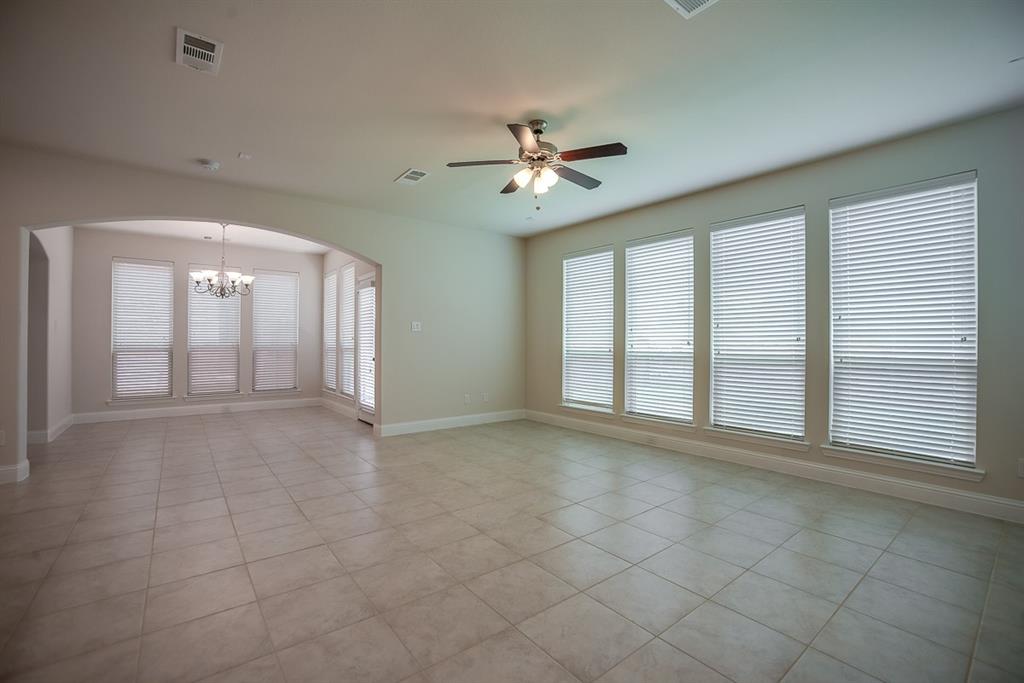 3412 Damsel Sauvage Lane Lewisville, TX 75056 - Photo 19 of 28 a view of an empty room with a window