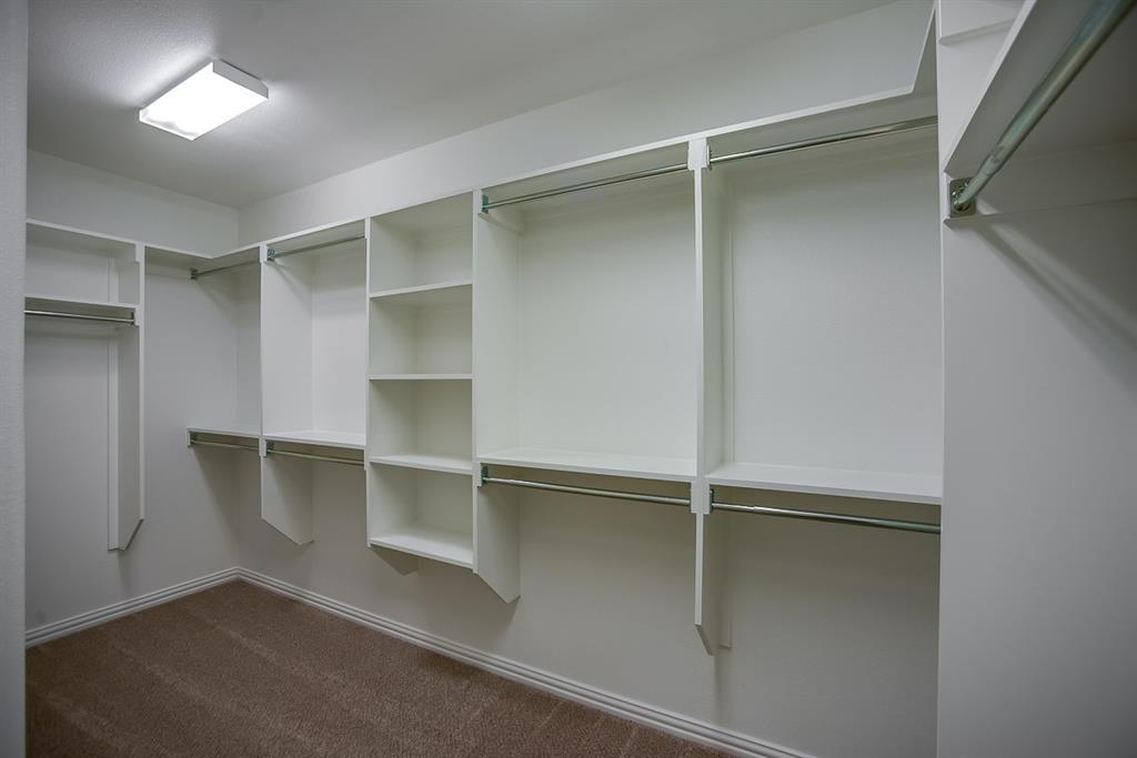 3412 Damsel Sauvage Lane Lewisville, TX 75056 - Photo 24 of 28 a room with walk in closet