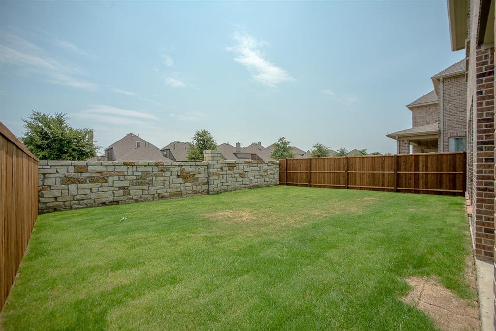 3412 Damsel Sauvage Lane Lewisville, TX 75056 - Photo 26 of 28 a view of outdoor space and yard