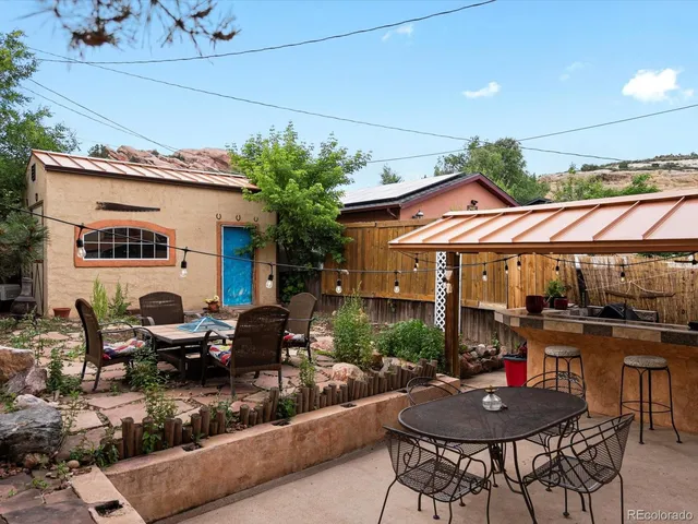 a view of outdoor space with chairs