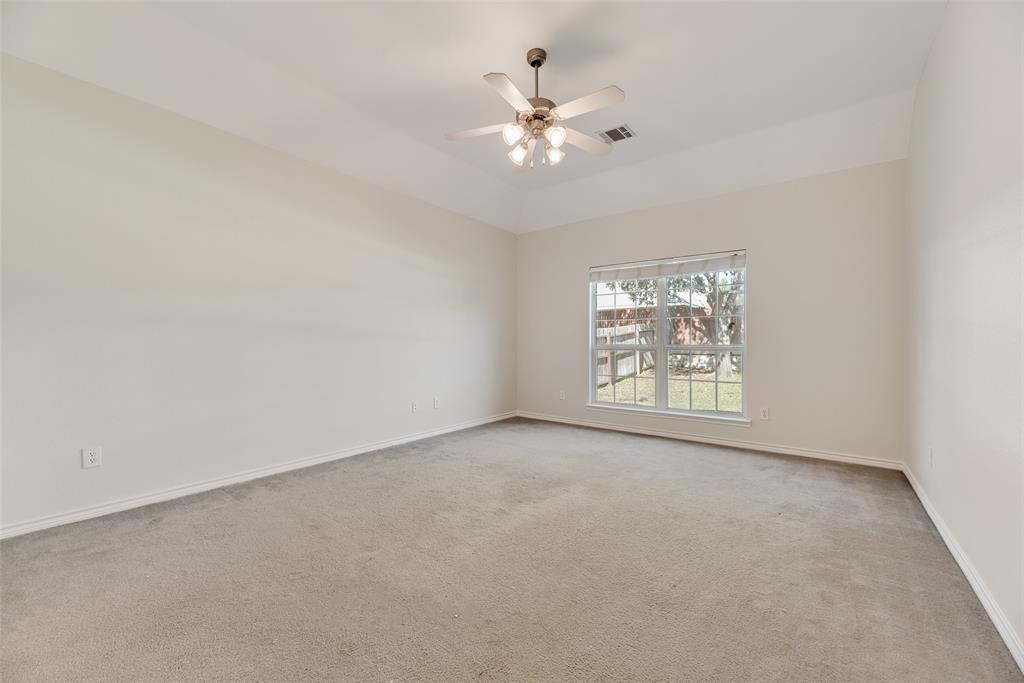 8004 Laughing Waters Trail McKinney, TX 75070 - Photo 19 of 24 a view of an empty room with a window