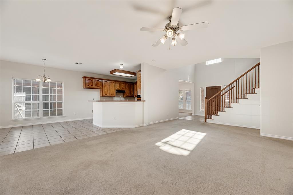 8004 Laughing Waters Trail McKinney, TX 75070 - Photo 5 of 24 a view of an empty room with a window