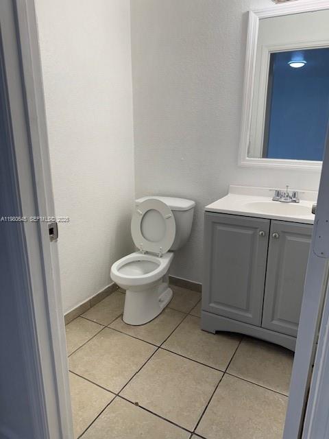 28107 Southwest 143rd Court, Unit 28107 Homestead, FL 33033 - Photo 10 of 10 a bathroom with a sink toilet and vanity
