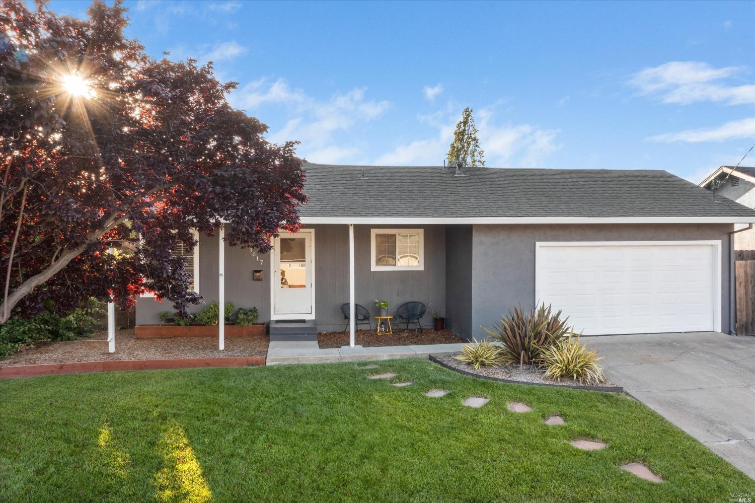 1617 Jeffrey Drive Petaluma, CA 94954 - Photo 1 of 1 a backyard of a house with table and chairs