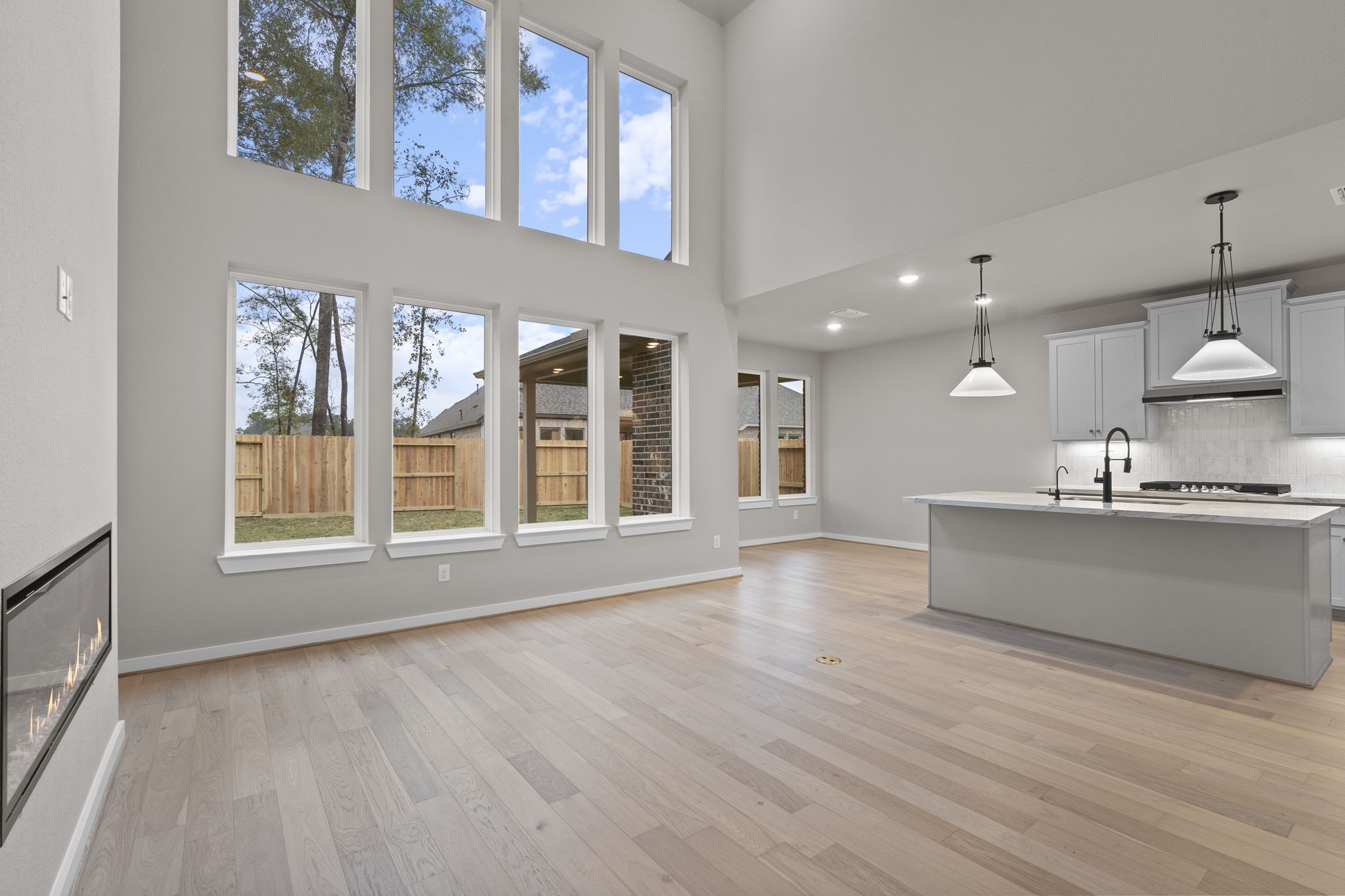 9434 Pacific Crest Porter, TX 77365 - Photo 2 of 50 Family room with fireplace.