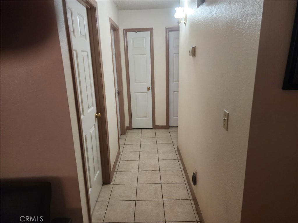 725 18th Place Delano, CA 93215 - Photo 18 of 36 a view of hallway with shower