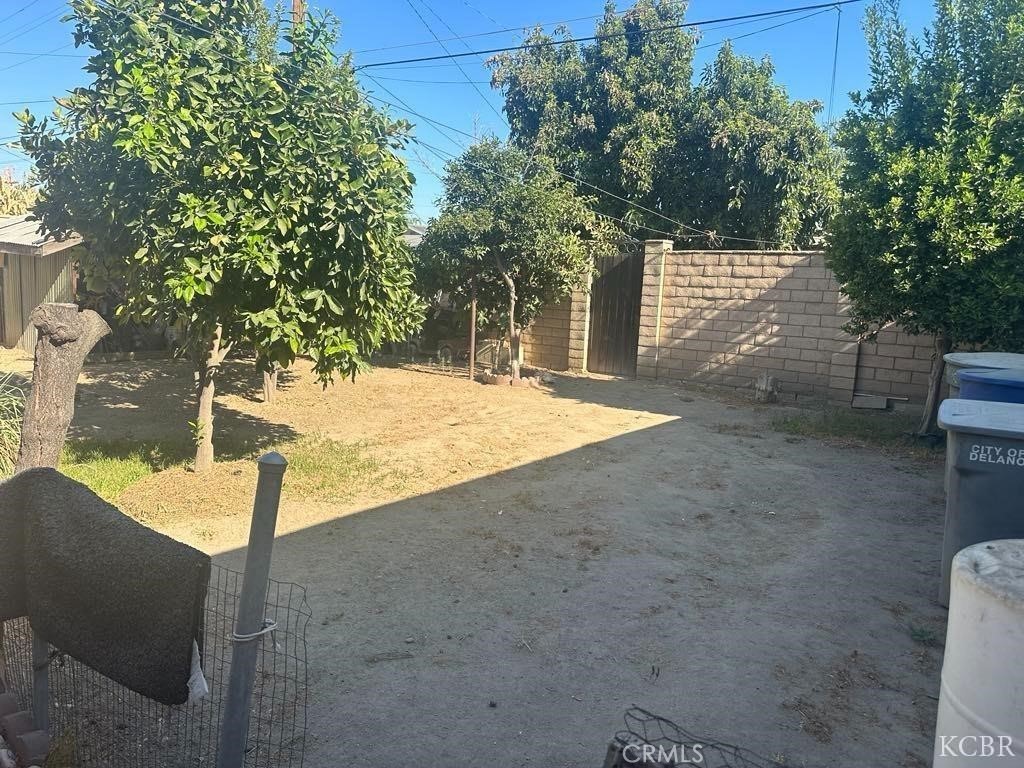 725 18th Place Delano, CA 93215 - Photo 35 of 36 a view of backyard with green space