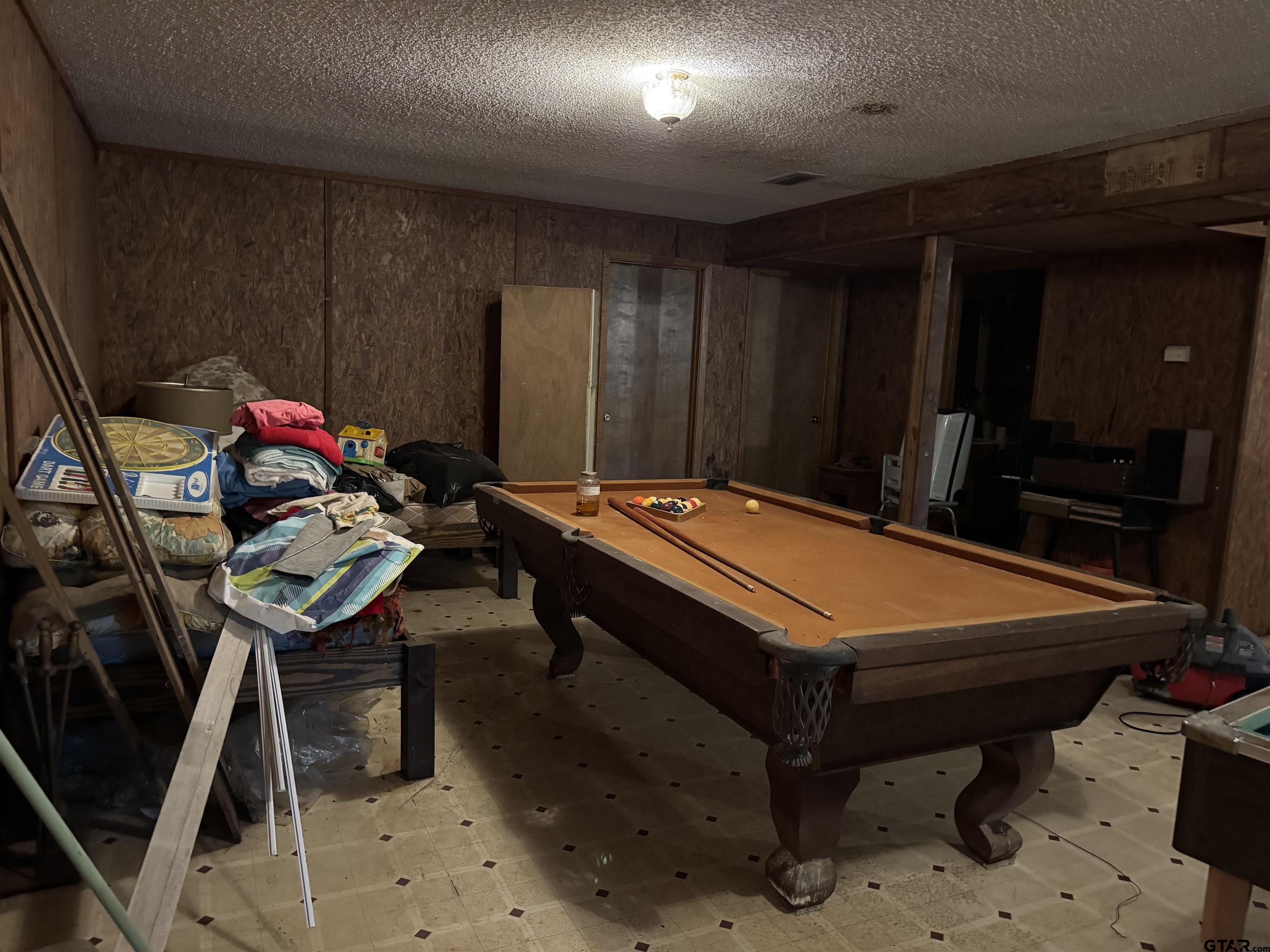 289 Llano Bend Holly Lake Ranch, TX 75765 - Photo 21 of 48 a room with pool table and chairs