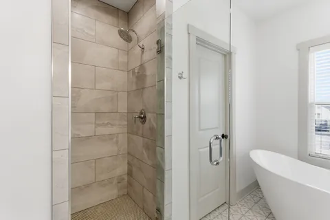 a bedroom with a bed and a book shelf