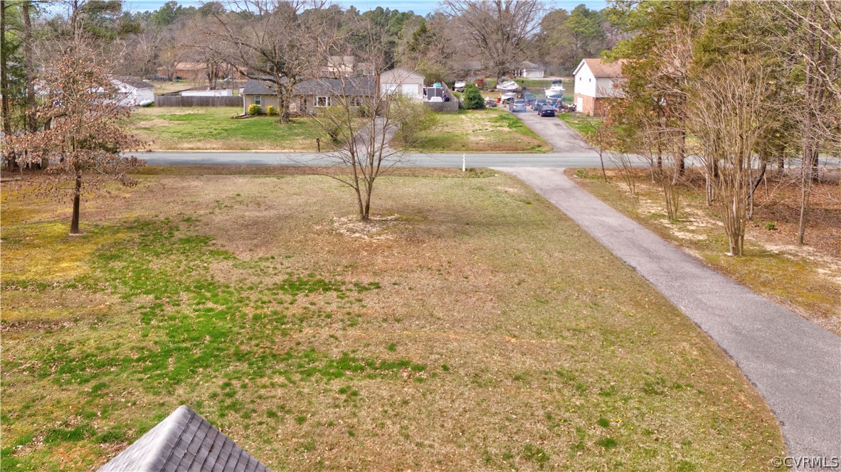 8561 Roundabout Road Henrico, VA 23231 - Photo 11 of 42 a view of a yard with wooden fence