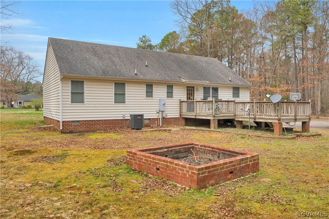 8561 Roundabout Road Henrico, VA 23231 - Photo 20 of 42 a front view of a house with a yard