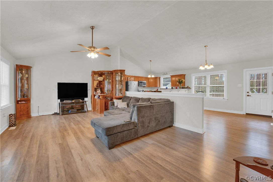 8561 Roundabout Road Henrico, VA 23231 - Photo 23 of 42 a living room with furniture and a flat screen tv