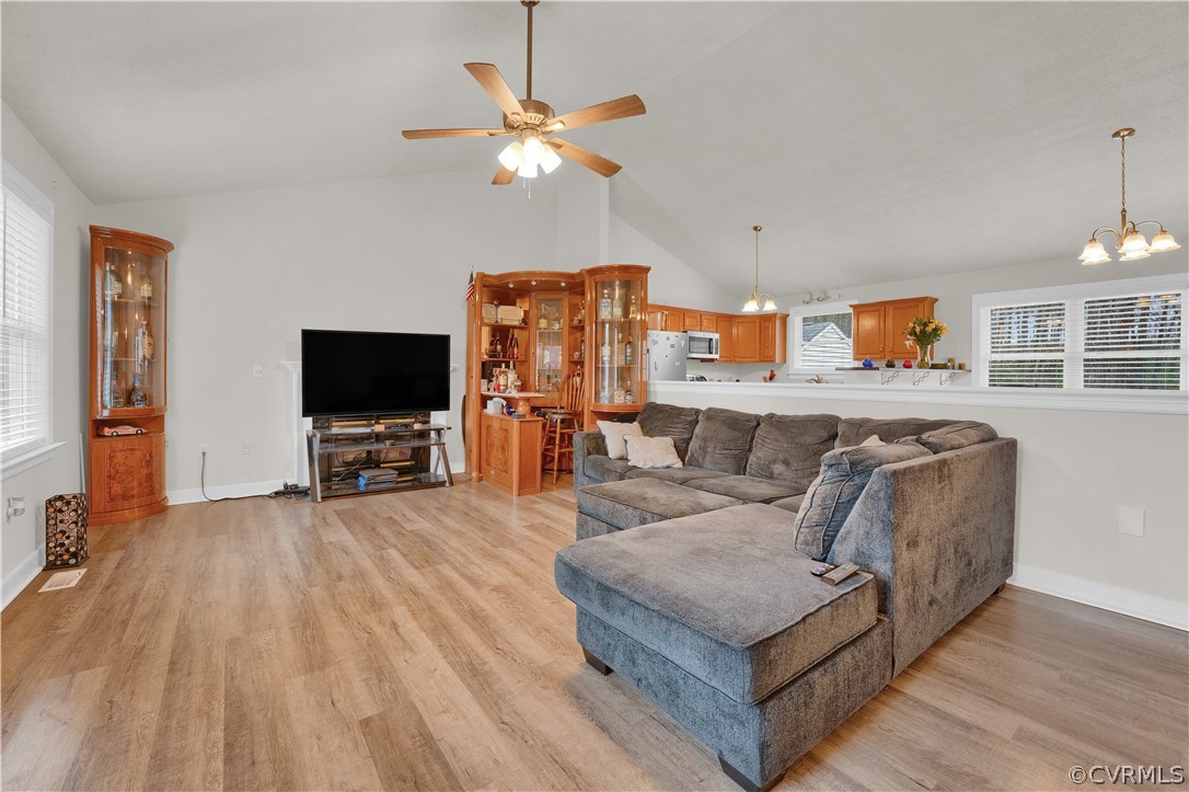 8561 Roundabout Road Henrico, VA 23231 - Photo 25 of 42 a living room with furniture and a flat screen tv