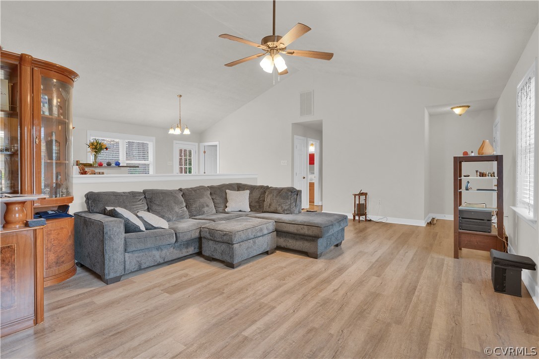 8561 Roundabout Road Henrico, VA 23231 - Photo 27 of 42 a living room with furniture and a flat screen tv