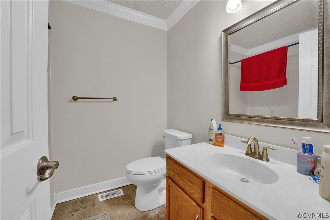 8561 Roundabout Road Henrico, VA 23231 - Photo 36 of 42 a bathroom with a sink and a toilet