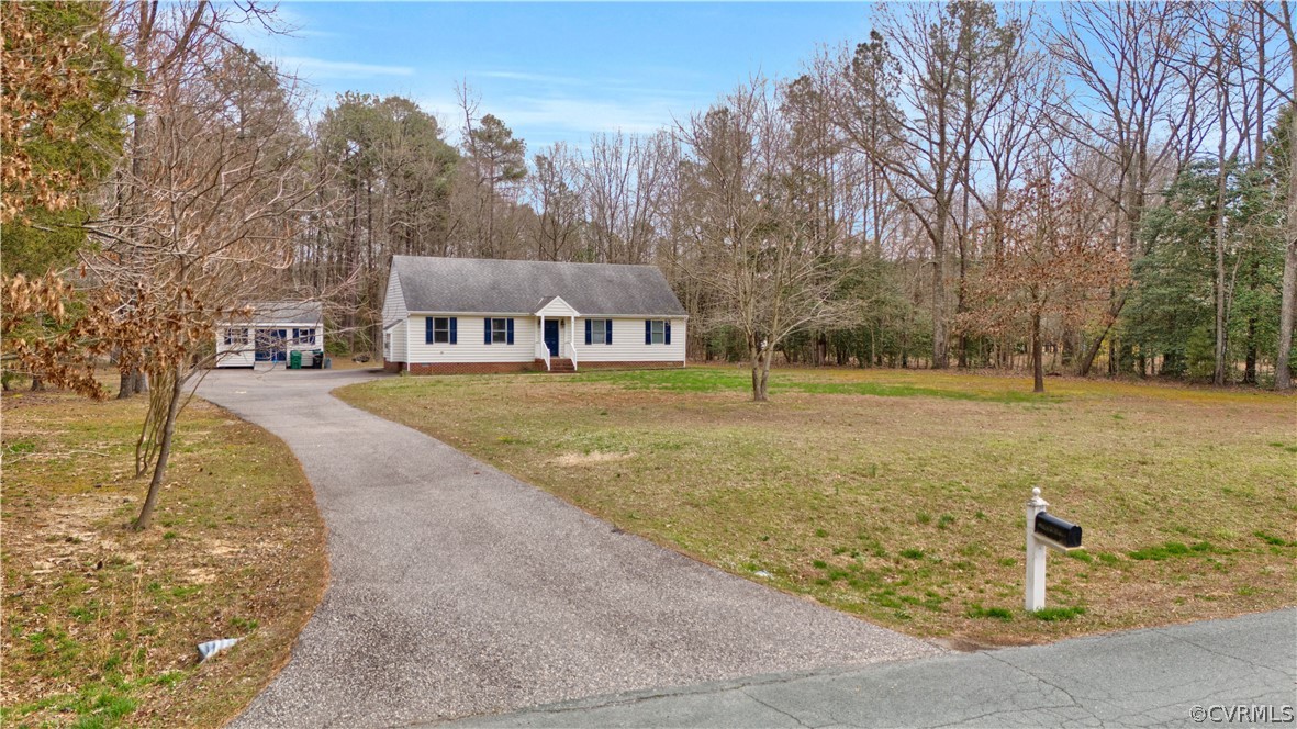 8561 Roundabout Road Henrico, VA 23231 - Photo 4 of 42 a view of a town with large trees