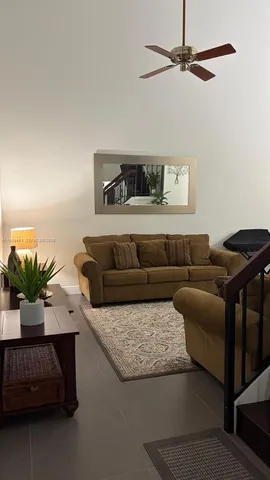 a living room with furniture and a couch