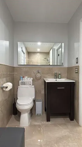 a bathroom with a sink and a toilet