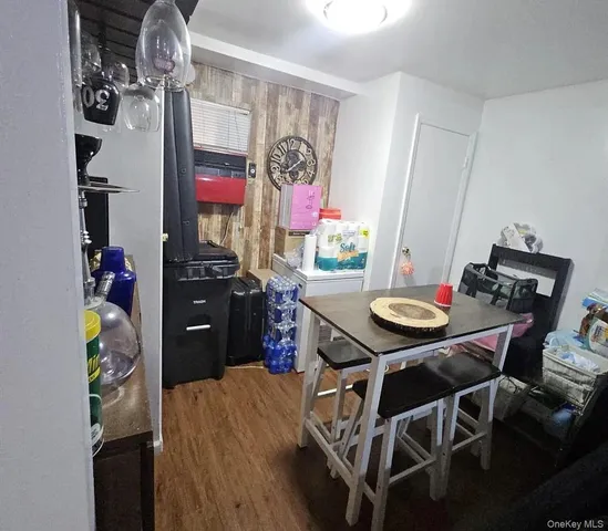 a kitchen with stainless steel appliances a stove a sink and a refrigerator