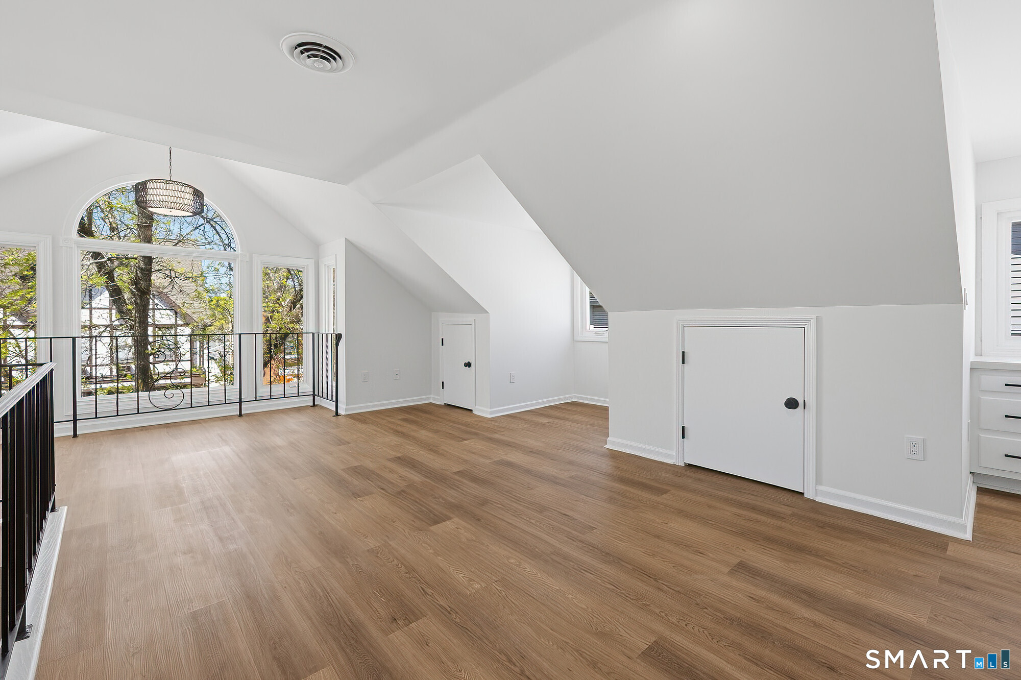 426 Main Street, Unit G Ridgefield, CT 06877 - Photo 11 of 24 a view of a livingroom with wooden floor